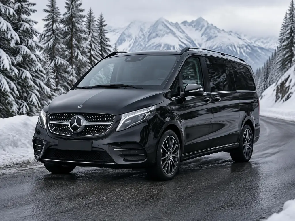 Van Mercedes Classe V noir sur une route de montagne enneigée